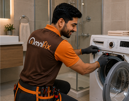 Technician repairing a washing machine